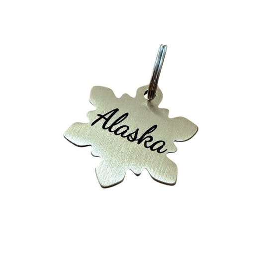 Brass snowflake medal 