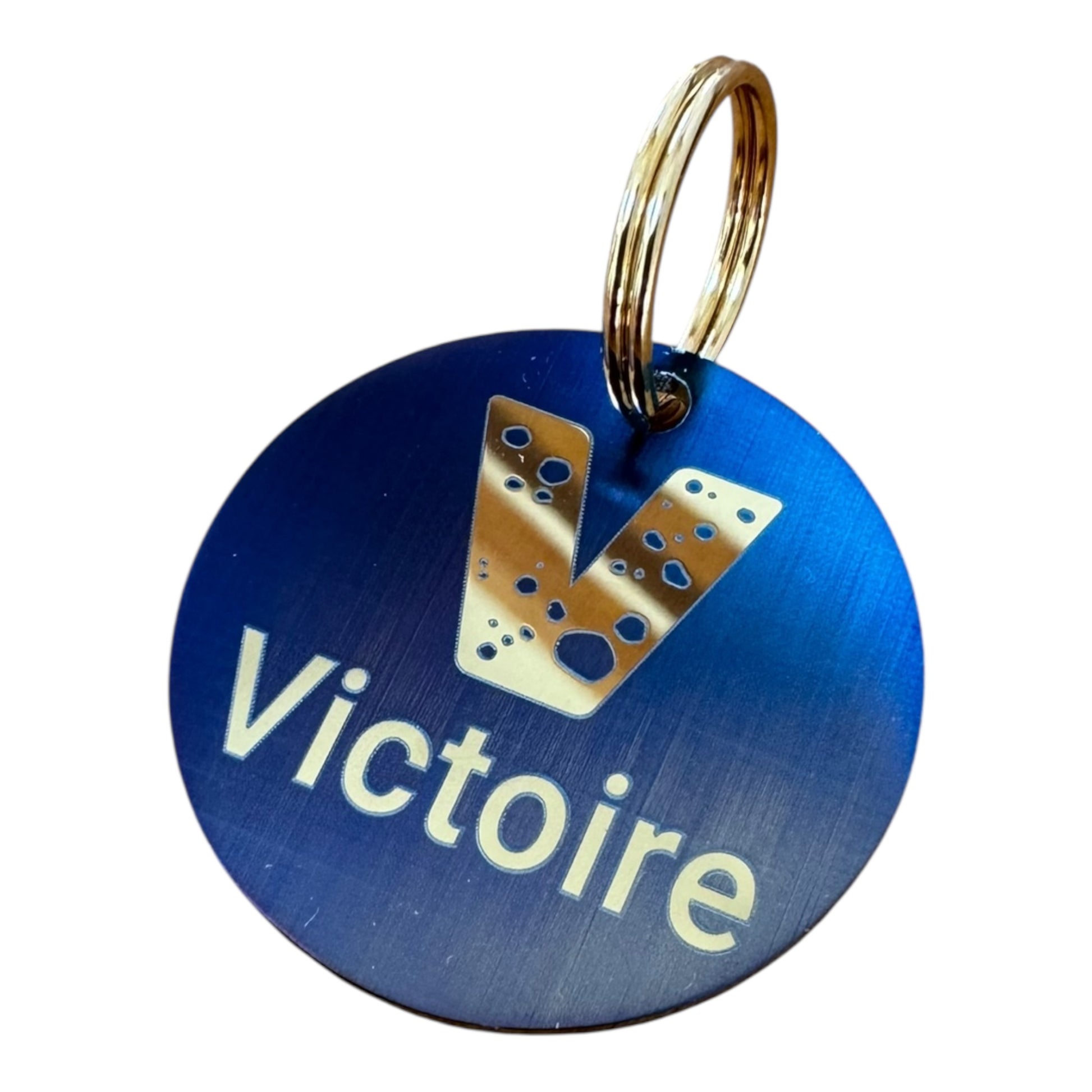 Médaille en acier inoxydable irisé, exemple de gravure